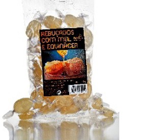 Pacote transparente de rebuçados com mel e equinácea com rótulo preto