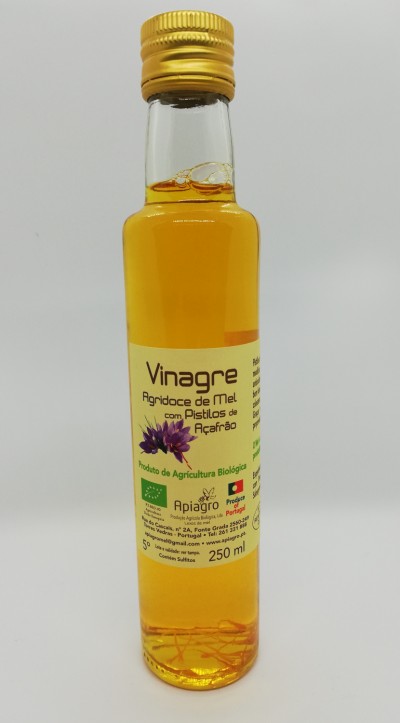 Garrafa de vinagre agri-doce de mel com pistilos de açafrão