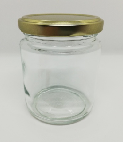 Frasco de vidro transparente com tampa dourada