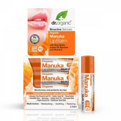 Bálsamo labial orgânico Manuka da dr.organic com embalagem branca e laranja e texto visível