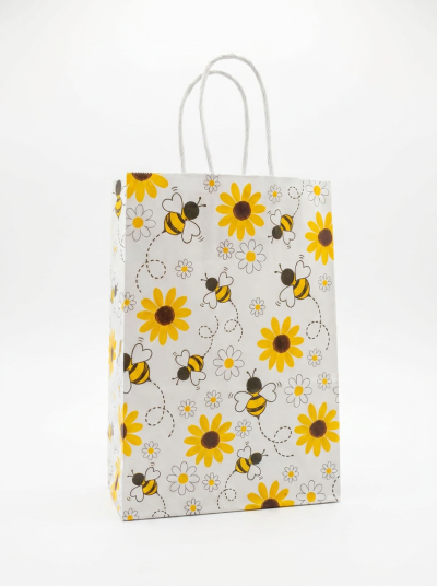 Saco de papel decorado com abelhas e flores amarelas