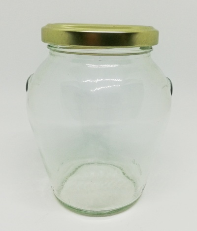 Frasco de vidro com tampa metálica dourada