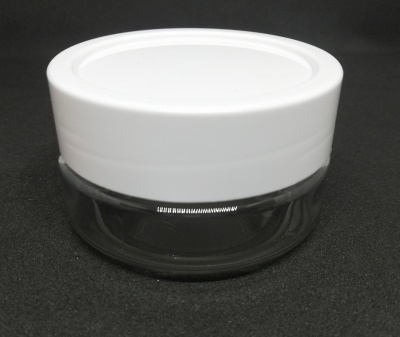 Frasco pequeno de vidro com tampa branca