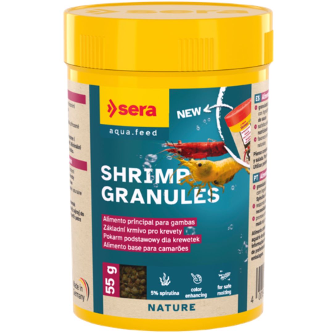 Sera Shrimp Granules - Alimento para camarões 100ml (55g) Embalagem amarela de alimento para camarões Sera Shrimp Granules com ilustração de camarões.