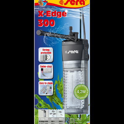 Embalagem do filtro aquário sera X-Edge 300, preto e transparente, texto funcional e energético, fundo azul com plantas