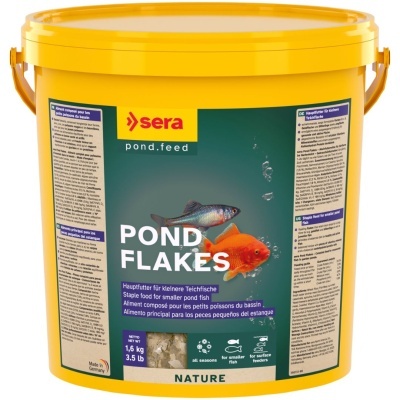 Embalagem amarela do alimento para peixes Pond Flakes da marca sera