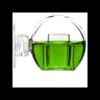 Frasco redondo de vidro com líquido verde e tampa redonda
