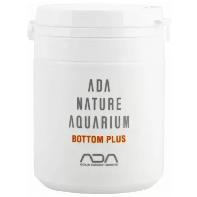 Embalagem plástica branca com texto ADA NATURE AQUARIUM BOTTOM PLUS e logo ADA