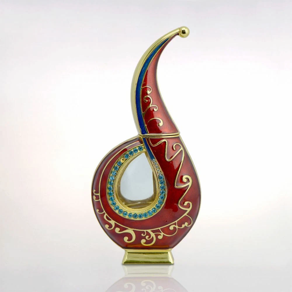 Frasco de perfume decorativo vermelho, azul e dourado com pedras azuis