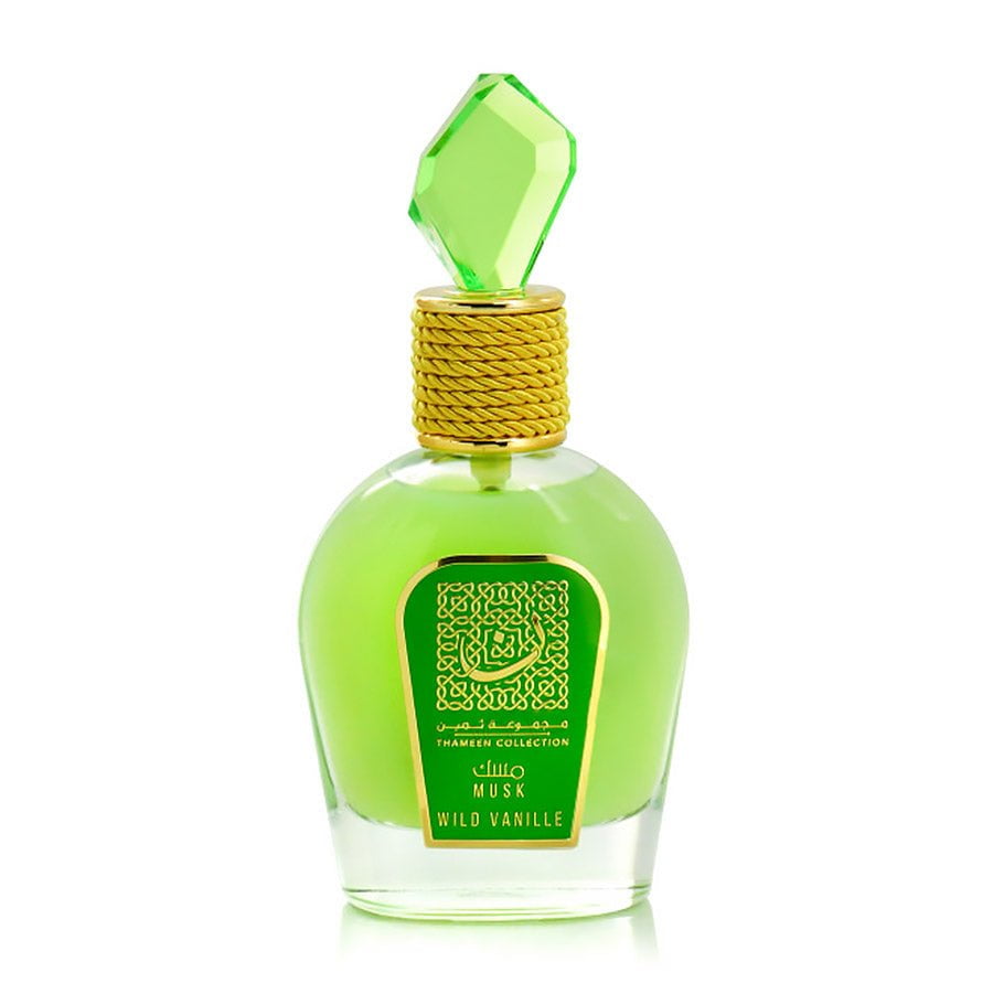 frasco de perfume verde claro com tampa em forma de gema verde e rótulo verde com texto dourado e branco