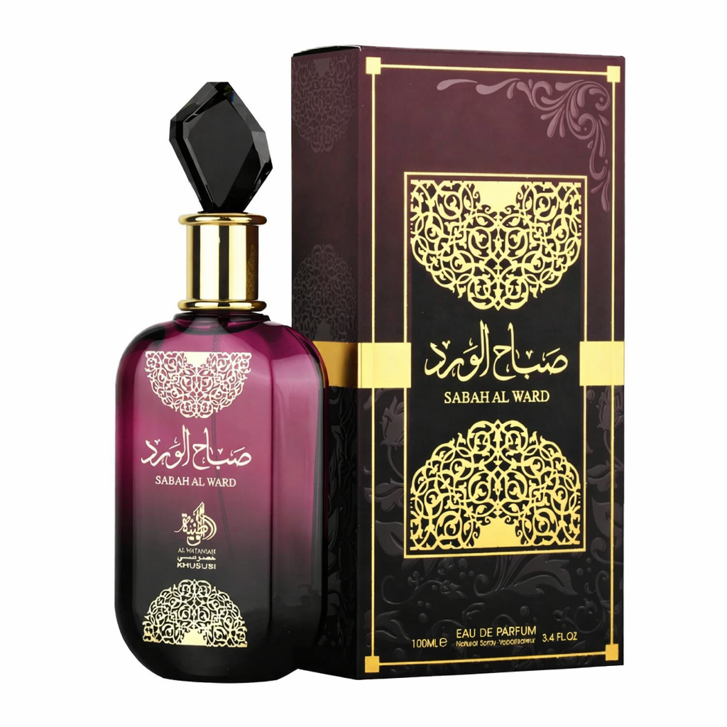 Frasco de perfume roxo com tampa preta e caixa preta dourada com ornamentos