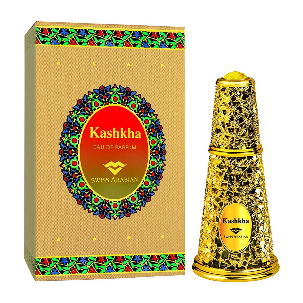 Frasco de perfume dourado Kashkha com embalagem colorida floral