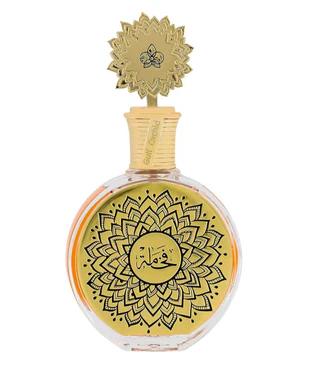 Frasco redondo de perfume com tampa dourada e rótulo amarelo com padrão floral preto