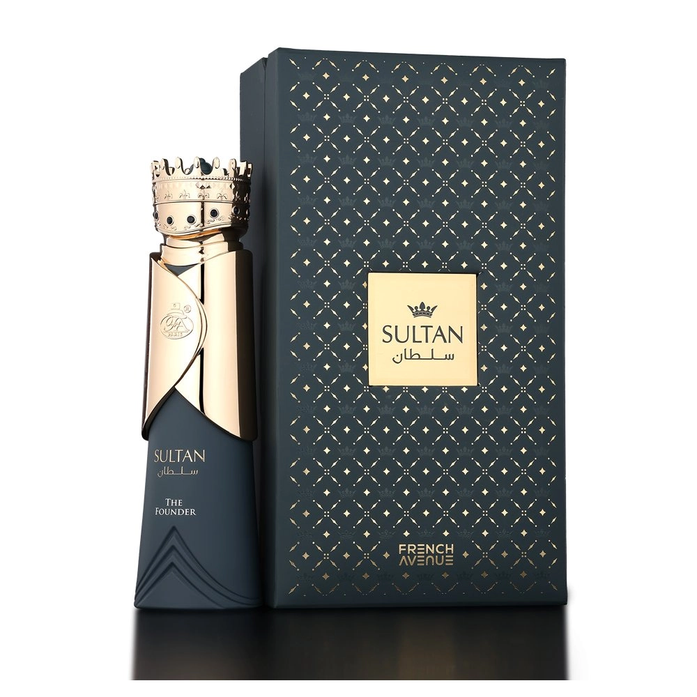 Frasco de perfume azul escuro com tampa dourada em forma de coroa e caixa decorativa azul escura com padrão dourado.
