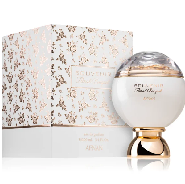 Frasco de perfume branco com base dourada e caixa branca decorada com padrão floral dourado