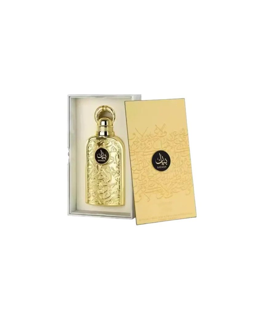 Frasco de perfume dourado em caixa dourada com selo preto