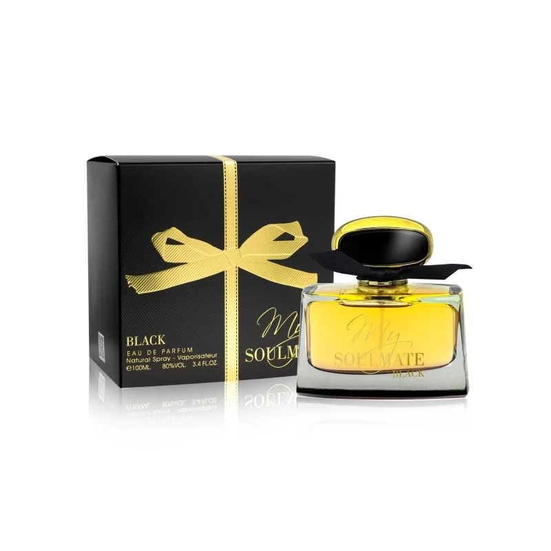 Frasco de perfume amarelo com tampa preta e dourada ao lado de caixa preta com laço amarelo e texto dourado
