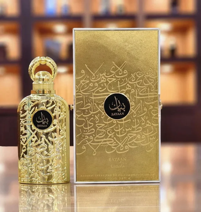 Frasco de perfume dourado com padrão decorativo e caixa dourada BAYAAN