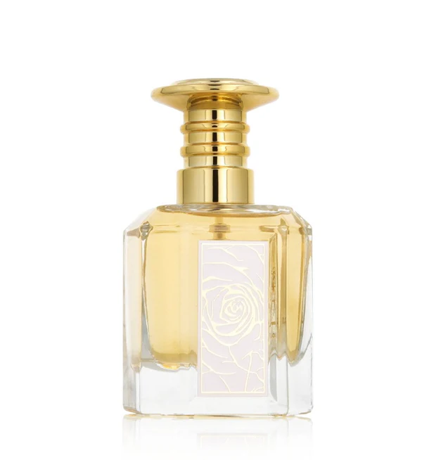 Frasco de perfume com tampa dourada e líquido amarelo claro