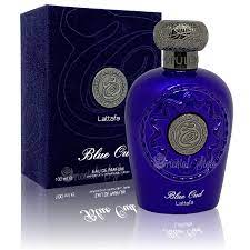 Frasco de perfume azul com tampa prateada e caixa azul escuro