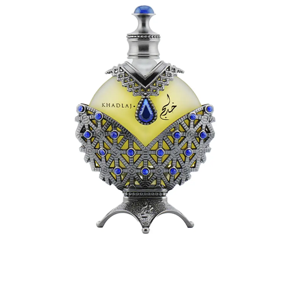 Frasco de perfume decorativo amarelo com detalhes em metal prateado e pedras azuis