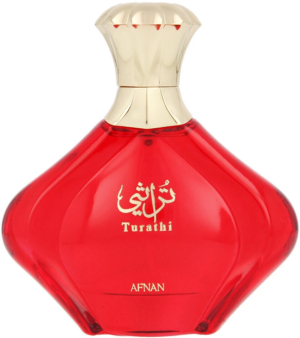 Frasco de perfume vermelho com tampa dourada e texto Turathi AFNAN