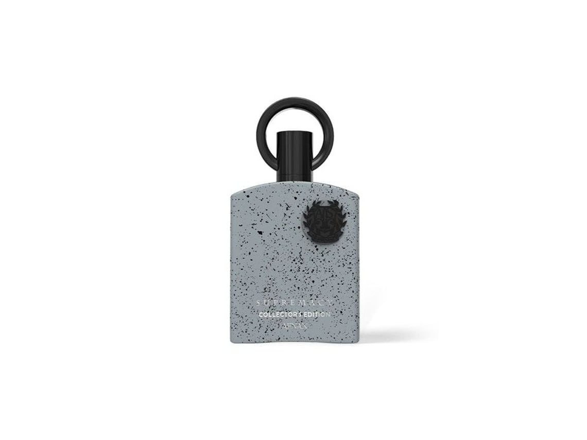 Frasco de perfume cinzento com manchas pretas e tampa preta