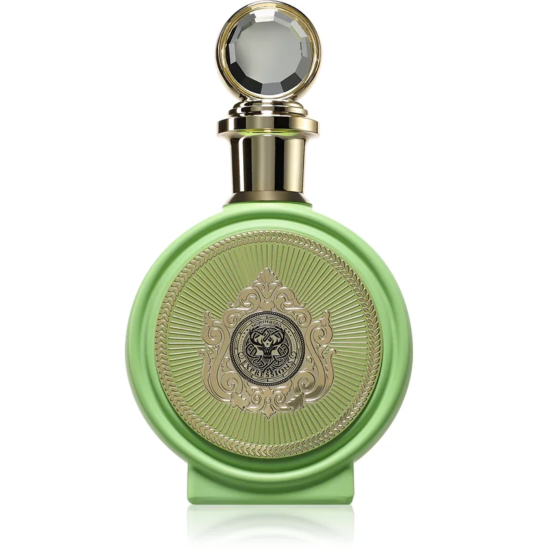 Frasco redondo de perfume verde com tampa dourada e pedra facetada
