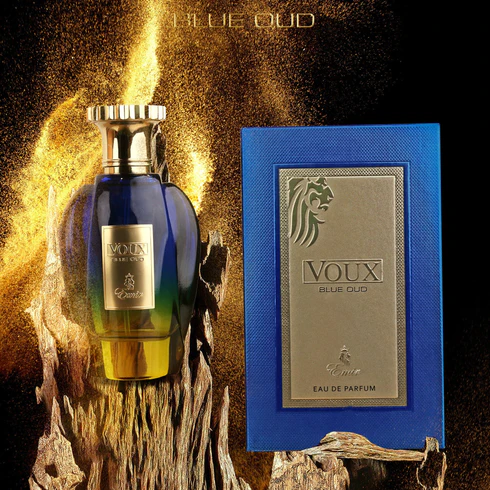 Frasco de perfume azul e embalagem azul com detalhes dourados