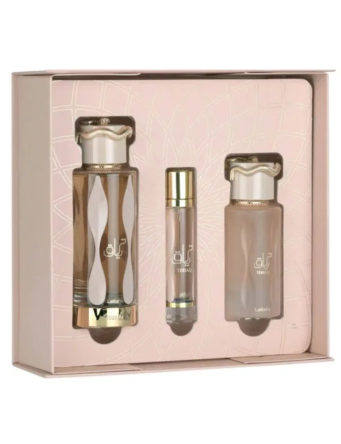 Conjunto de três frascos de perfume em caixa rosa com detalhes dourados