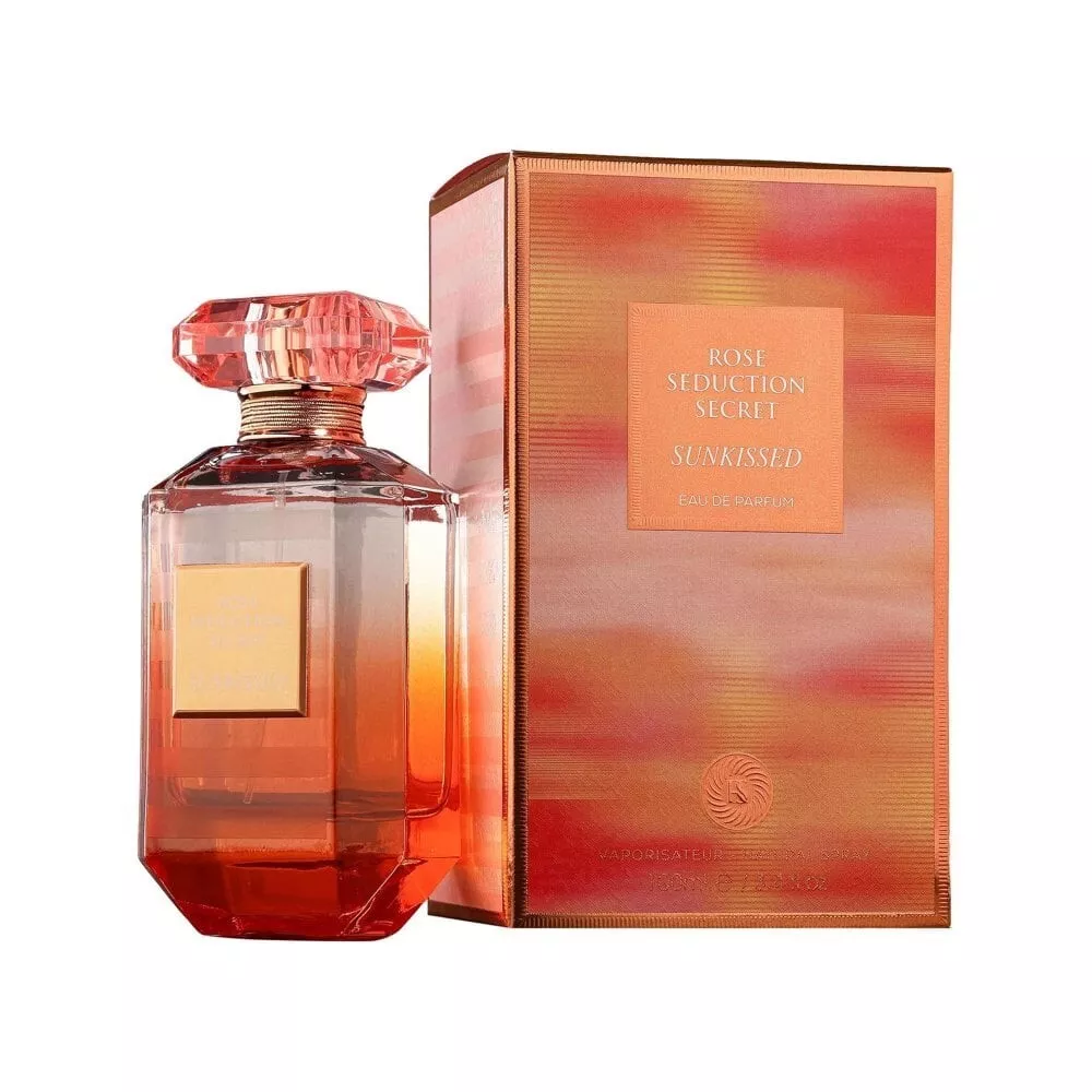 Frasco de perfume com caixa rosa e dourada