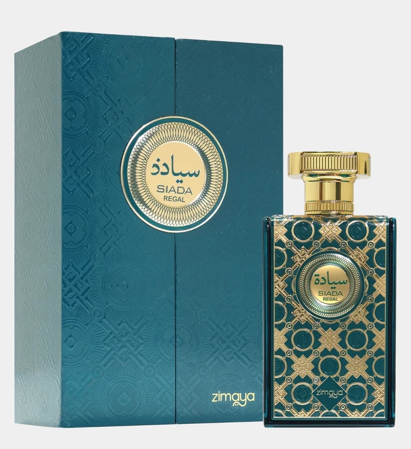 Frasco de perfume azul escuro com padrões dourados e caixa azul escuro com textura e padrão
