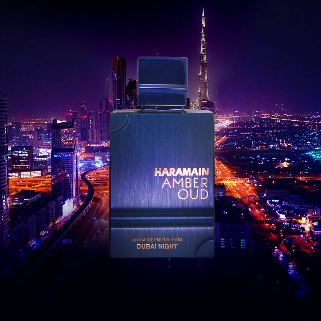 Perfume HARAMAIN AMBER OUD DUBAI NIGHT com fundo noturno de cidade