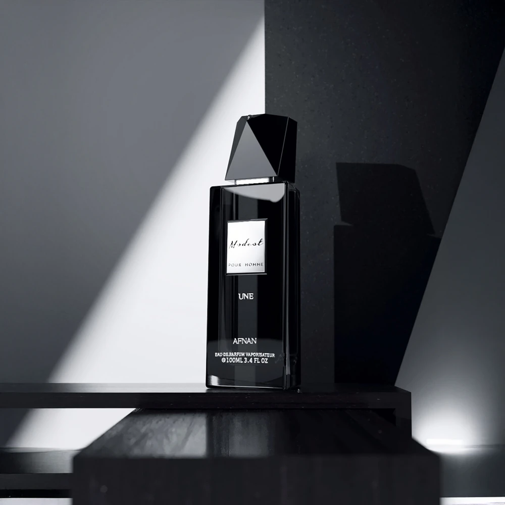 Frasco de perfume Afnan Line preto com tampa geométrica numa superfície escura e fundo cinzento