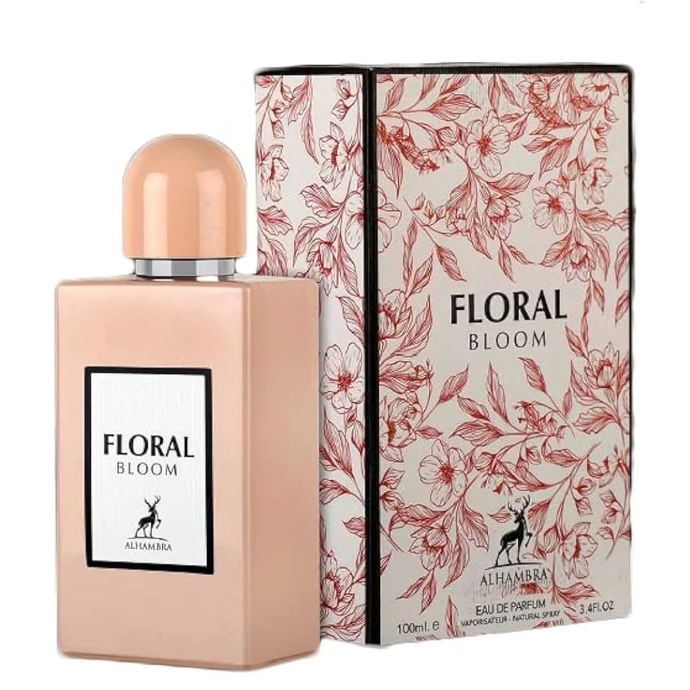 Frasco de perfume rosa com rótulo preto e branco ao lado de caixa decorada com flores vermelhas