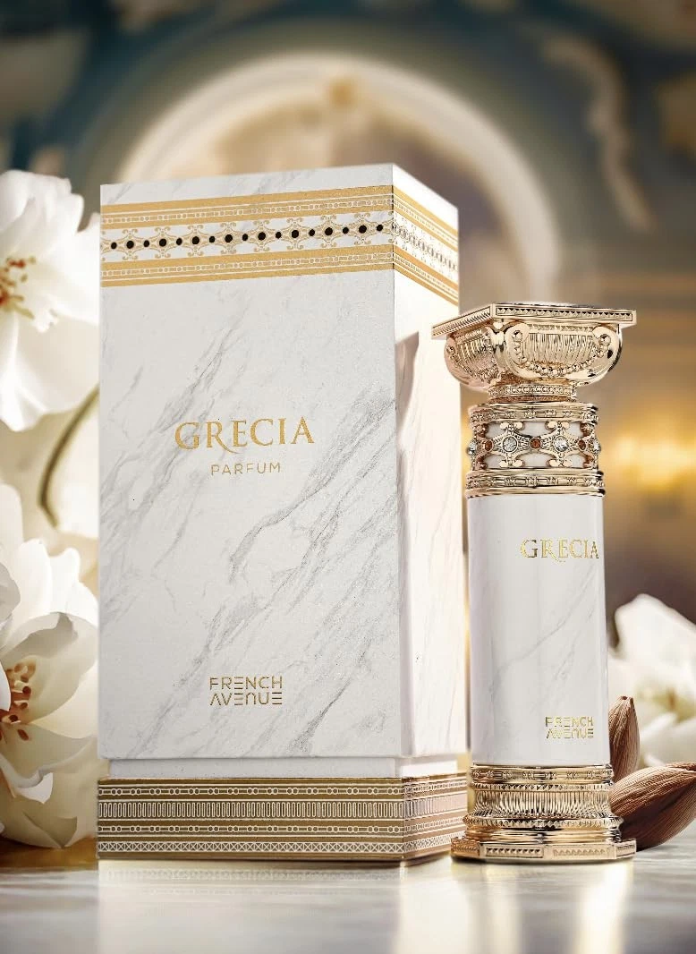 Frasco de perfume e caixa branca decorados a dourado com flores