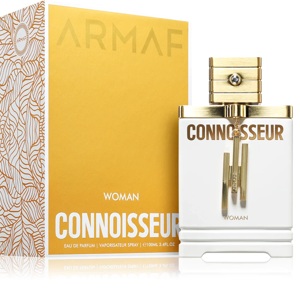 Frasco de perfume branco e dourado com caixa amarela e branca, produto para mulher