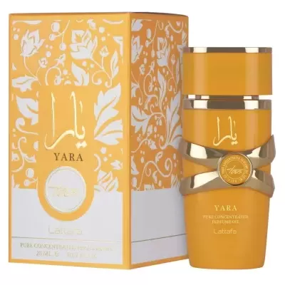 Frasco de perfume amarelo e dourado com caixa ao lado