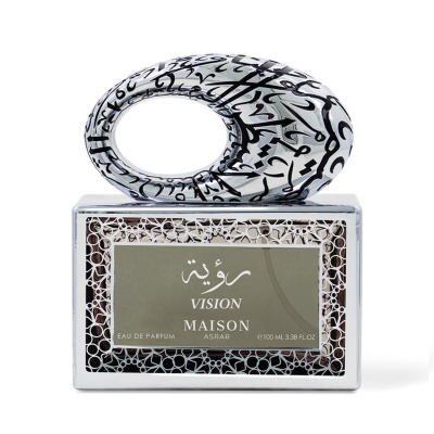 Frasco de perfume retangular com tampa oval decorada e rótulo verde com texto branco