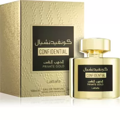 Frasco dourado de perfume com caixa dourada e etiquetas pretas com texto em árabe e inglês