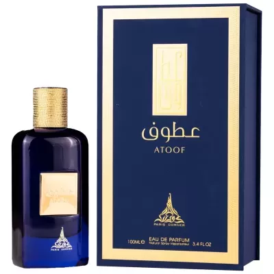 Frasco de perfume azul escuro com tampa dourada texturada ao lado de caixa azul com bordadura dourada e textos ATOOF PARIS CORNER EAU DE PARFUM.