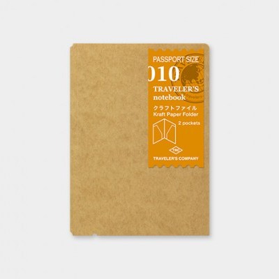 Caderno de viagem com capa de papel kraft e etiqueta laranja