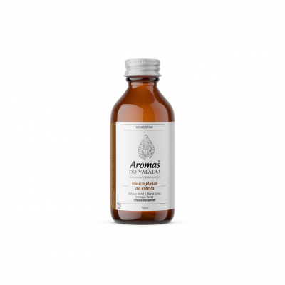 Frasco castanho com rótulo branco e texto Aromas do Valado Tónico Floral de Esteva
