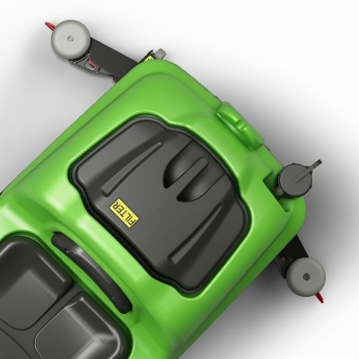 Máquina de cimento verde com painel preto e rodas cinzentas vista de cima