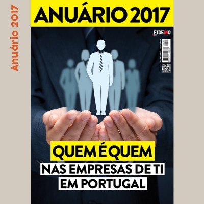 Capa do anuário 2017 com figuras de negócios seguradas por mãos.