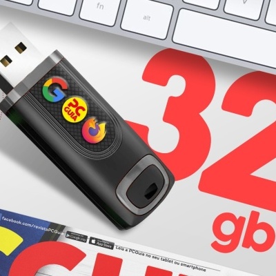 Pen USB preto com capacidade de 32 GB e logótipos coloridos sobre superfície branca