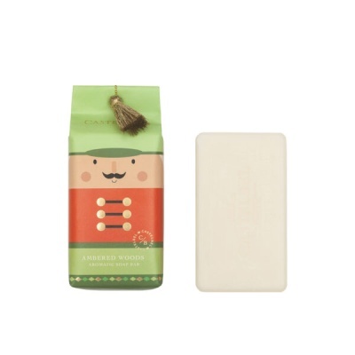 Sabonete creme com embalagem ilustrada de soldado de brinquedo verde e vermelho