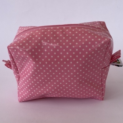 Necessaire rosa com bolinhas brancas e fecho de correr