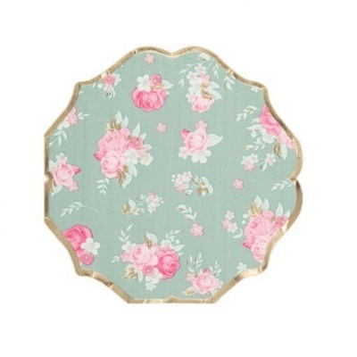Prato decorativo em porcelana com padrão floral rosa e verde e borda dourada ondulada
