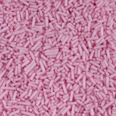 Confeitos cilíndricos cor de rosa para decoração